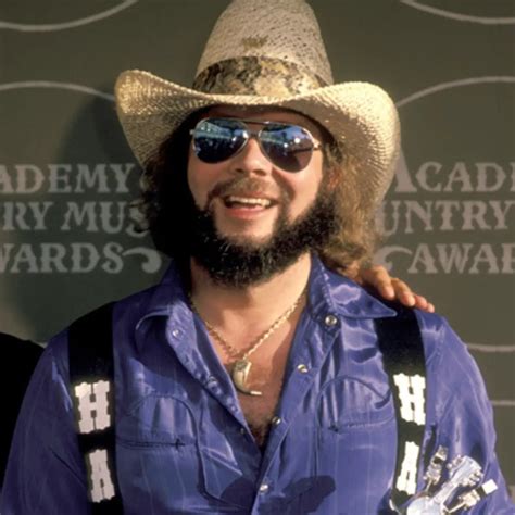 Hank junior - Hank Jr. began his career by covering his father’s songs, until he fell off of Ajax Peak in Montana. After this incident, Hank Jr. began to blend in southern rock, blues, and outlaw country ... 